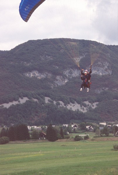 Erik flies and smiles.